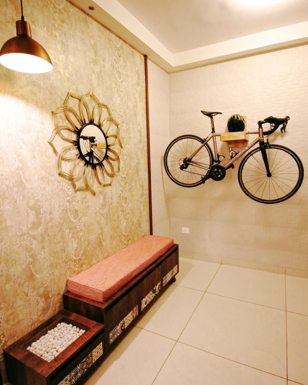 Cycle mounted on the wall at the entrance to portray love for cycling.